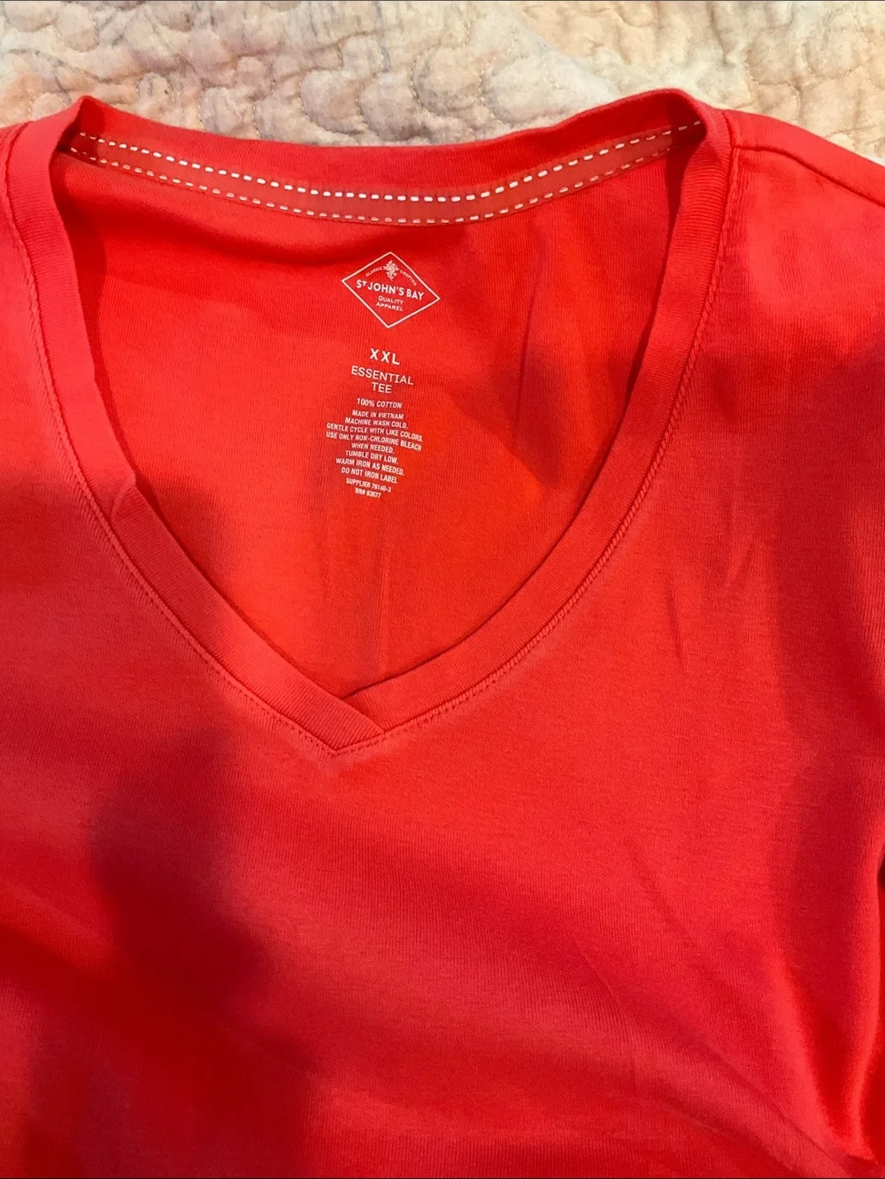 Coral Red V-Neck Top with Floral Navy Pants and Light Blue Tee